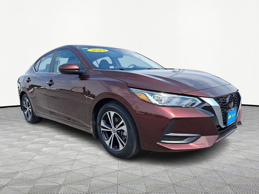 Used 2023 Rosewood Metallic Nissan SV image 1