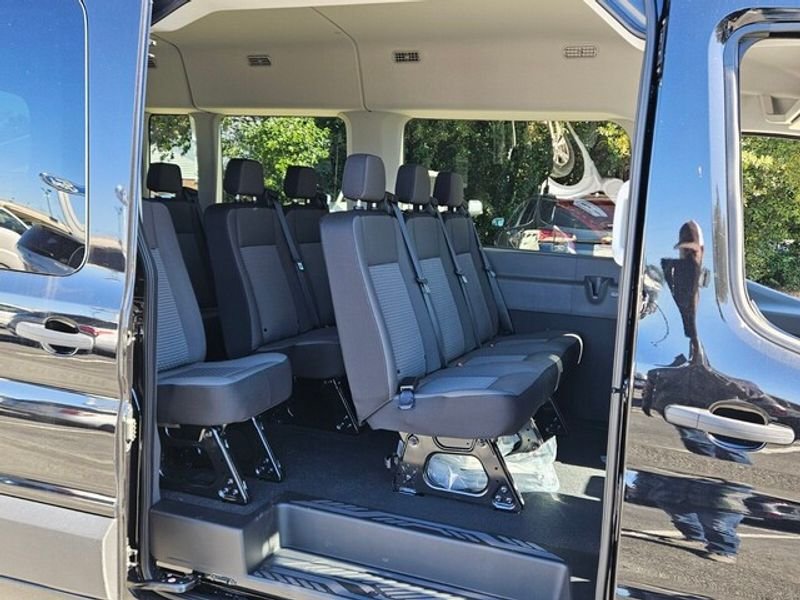 New 2025 Agate Black Metallic Ford Passenger Van XL image 11