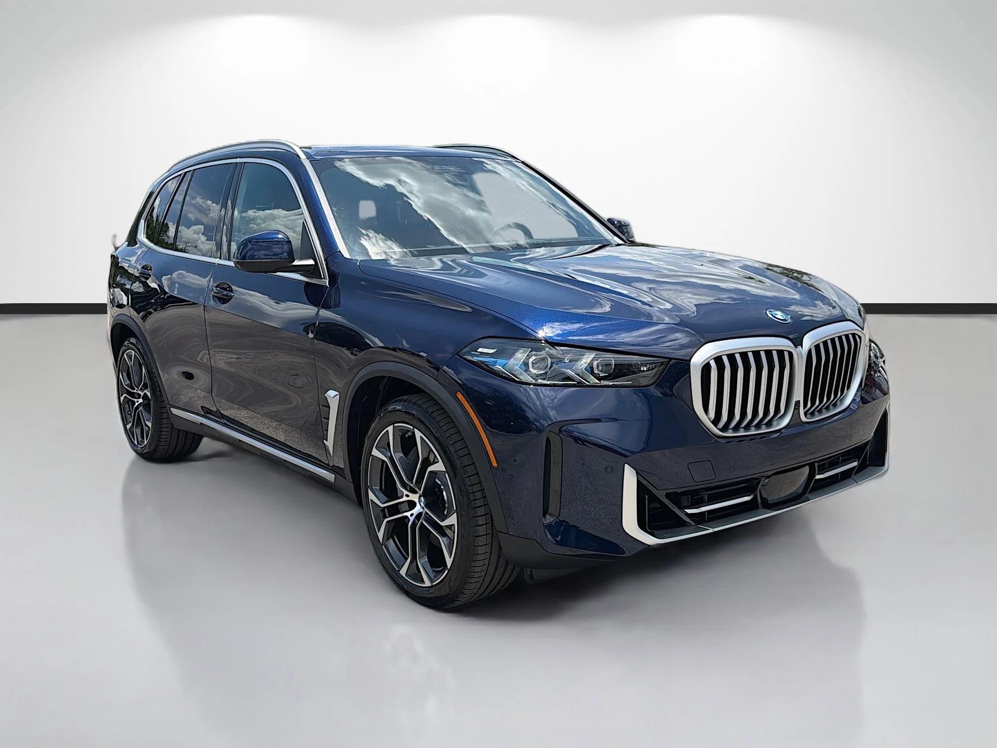New 2026 Tanzanite Blue II Metallic BMW xDrive50e image 1