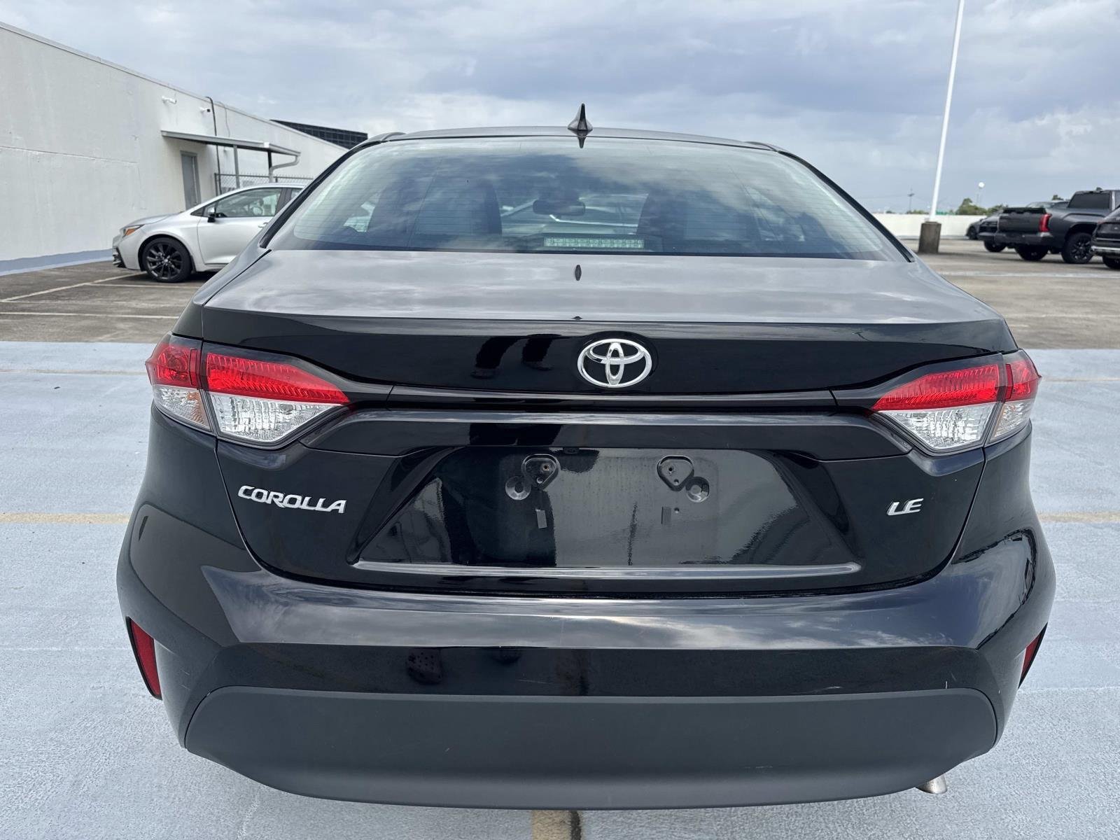 Used 2025 Midnight Black Metallic Toyota LE image 13