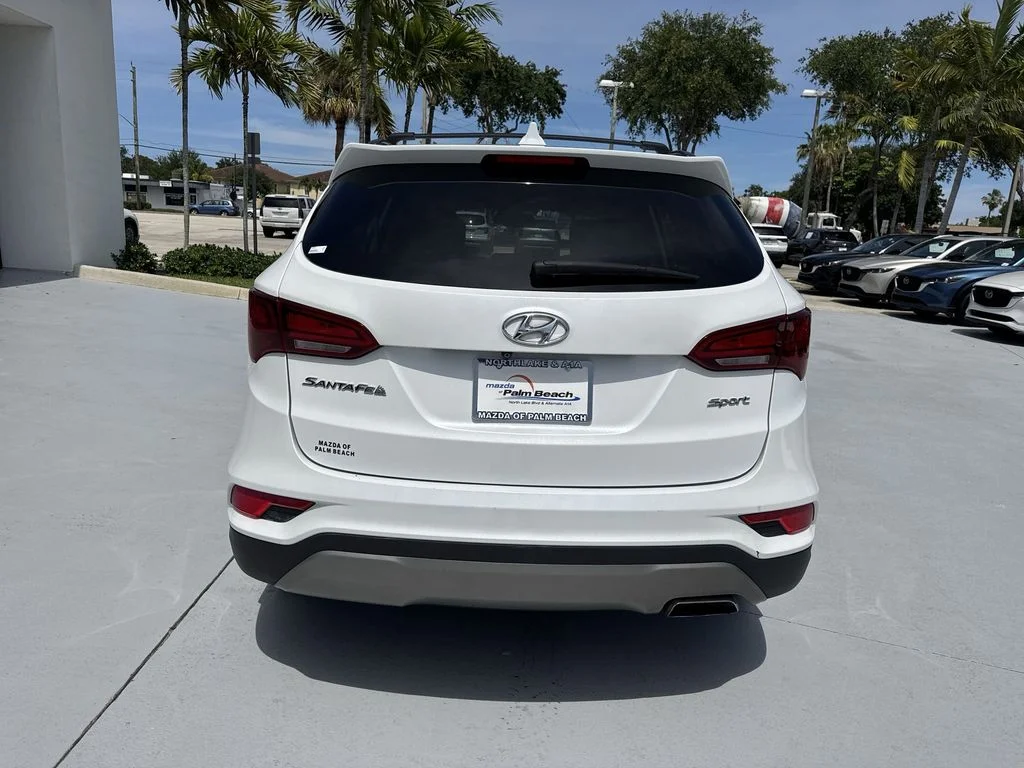 Used 2018 Hyundai Santa Fe Sport with VIN 5NMZU3LBXJH062811 for sale in North Palm Beach, FL