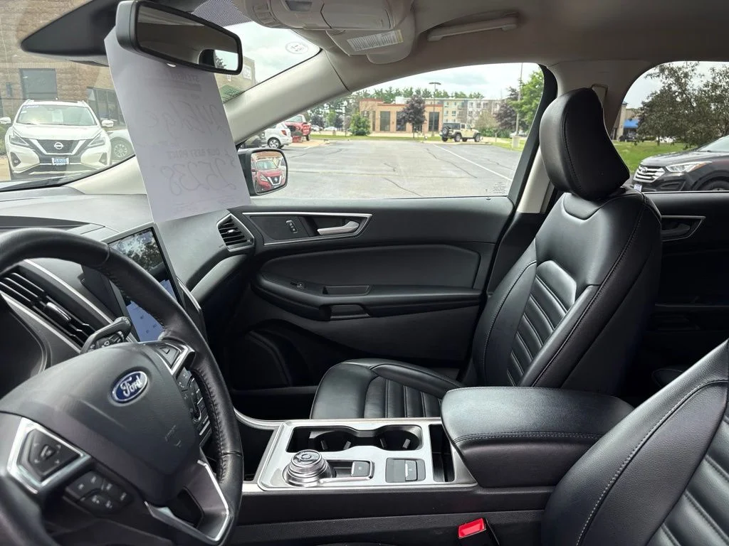 Used 2024 Agate Black Metallic Ford SEL image 12
