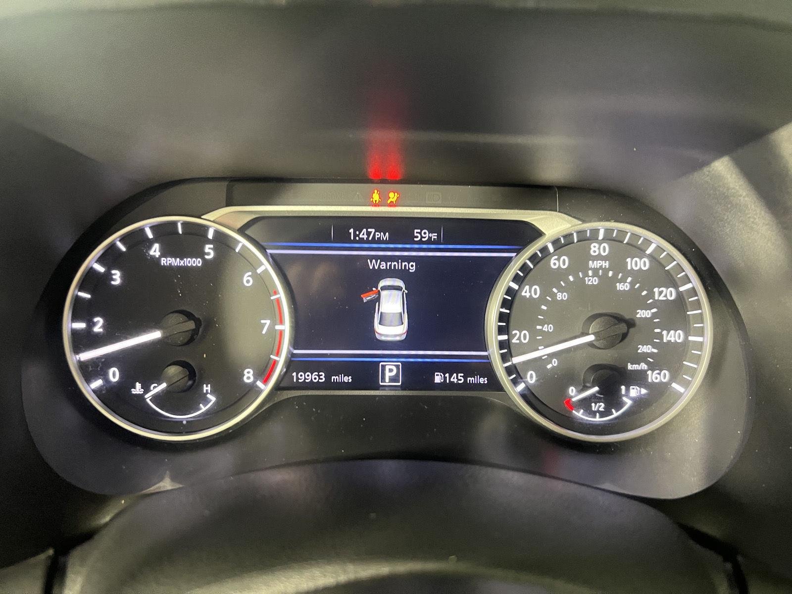 Used 2024 Electric Blue Metallic Nissan SV image 12