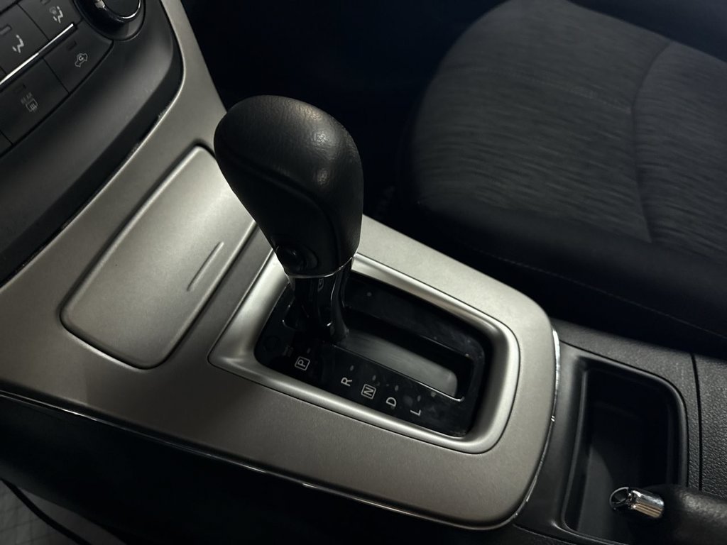 Used 2015 Gun Metallic Nissan SV image 23
