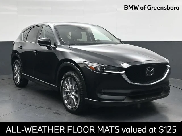 Used 2020 Black Mazda Grand Touring image 1