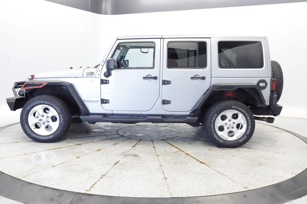 Used 2013 Jeep Wrangler Unlimited Sahara with VIN 1C4BJWEG1DL672894 for sale in Coon Rapids, Minnesota
