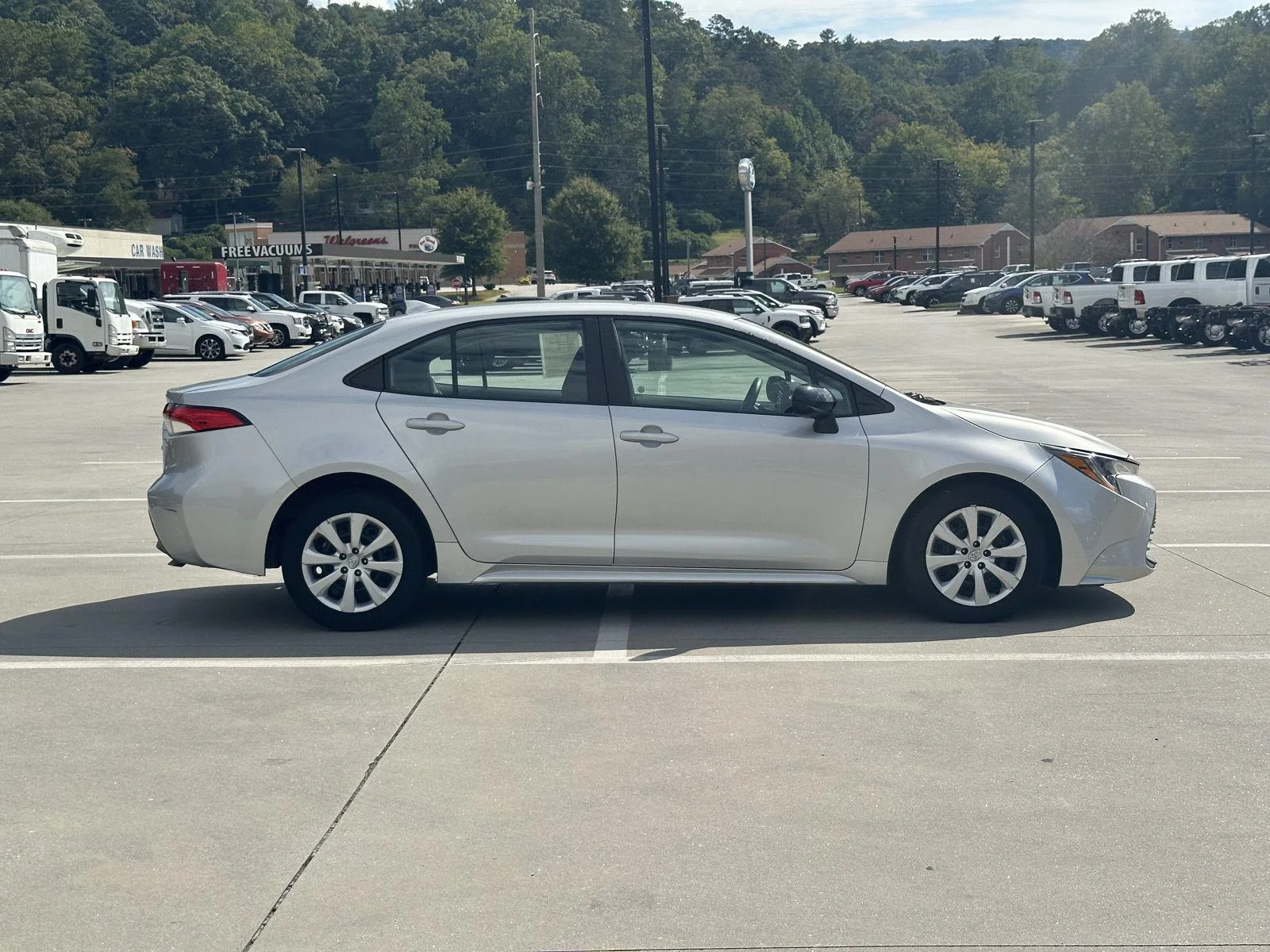 Used 2023 Classic Silver Metallic Toyota LE image 8