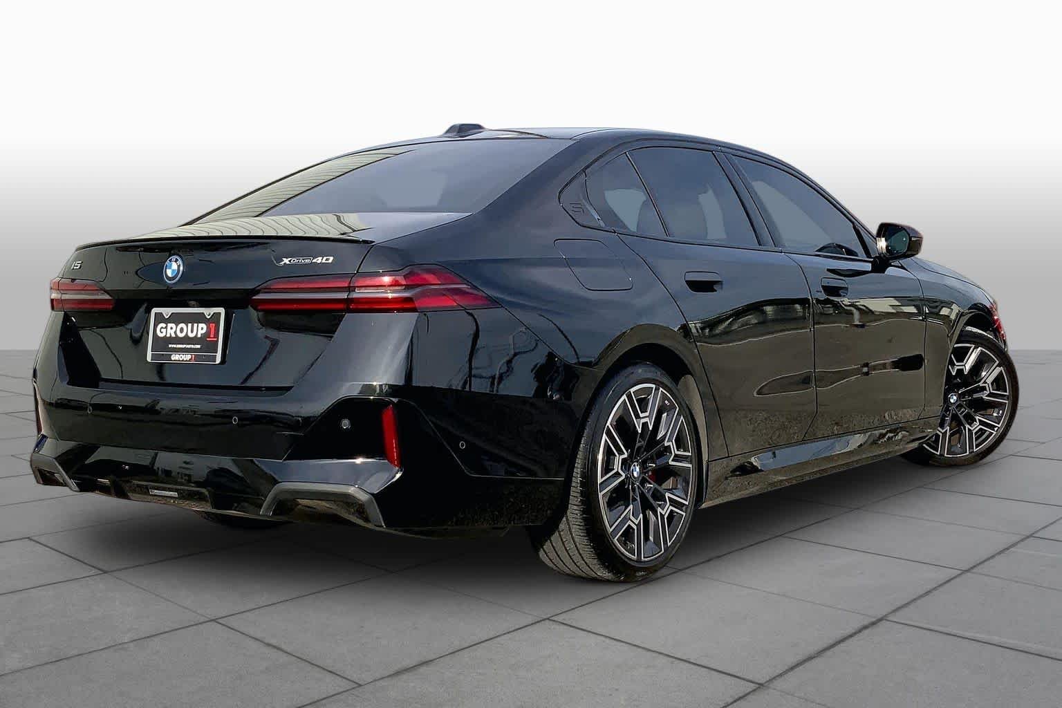 Used 2026 Black Sapphire Metallic BMW xDrive40 image 11
