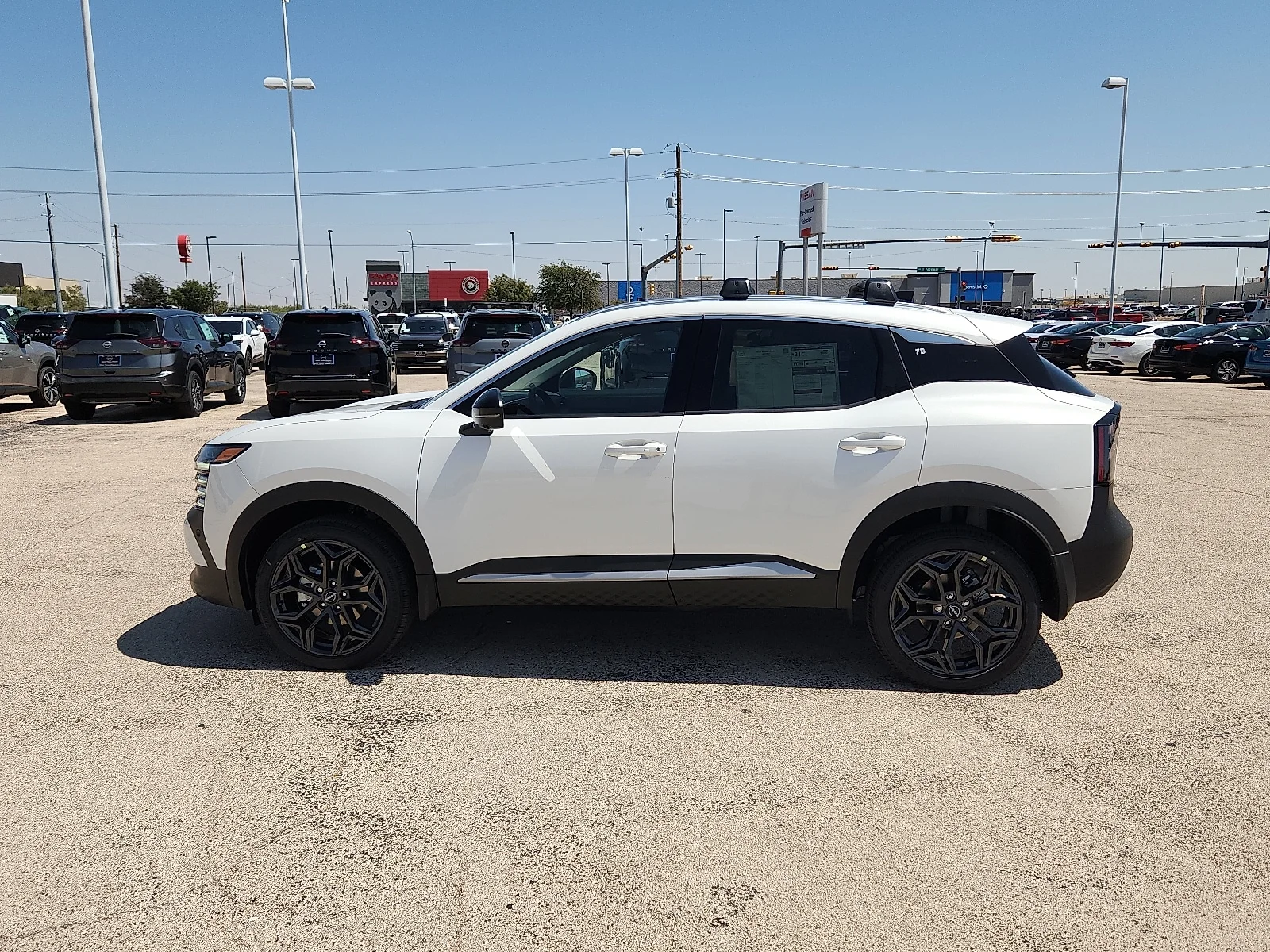 New 2026 QAC Aspen Whit Nissan SR Front-Wheel Drive image 2