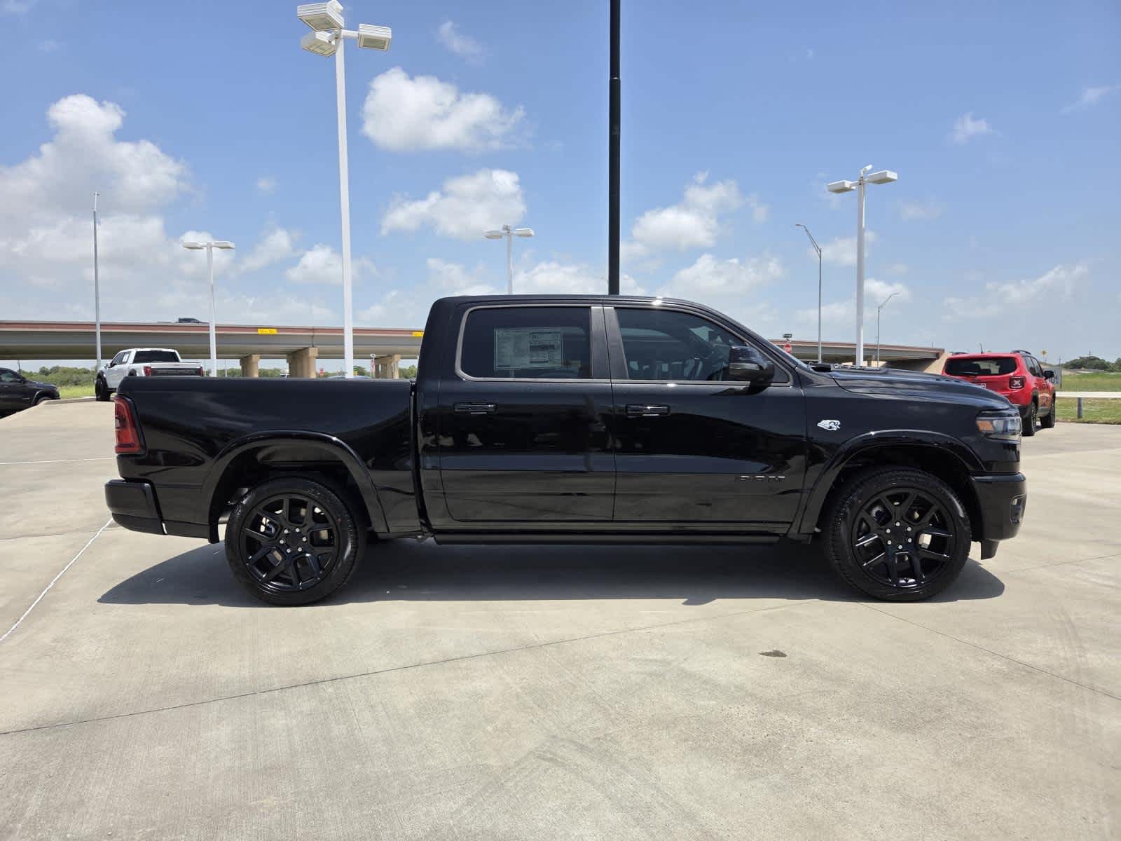 New 2026 Diamond Black Crystal Pearl-Coat Exterior Paint RAM Laramie image 6