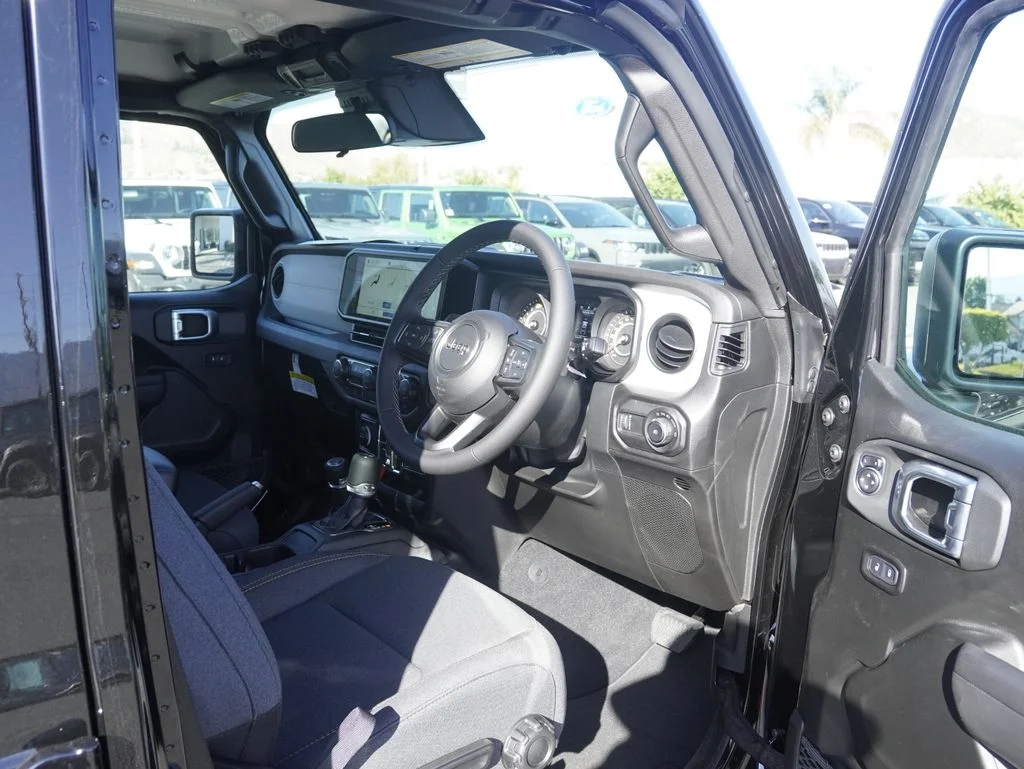 New 2026 black clearcoat Jeep Sport RHD image 24
