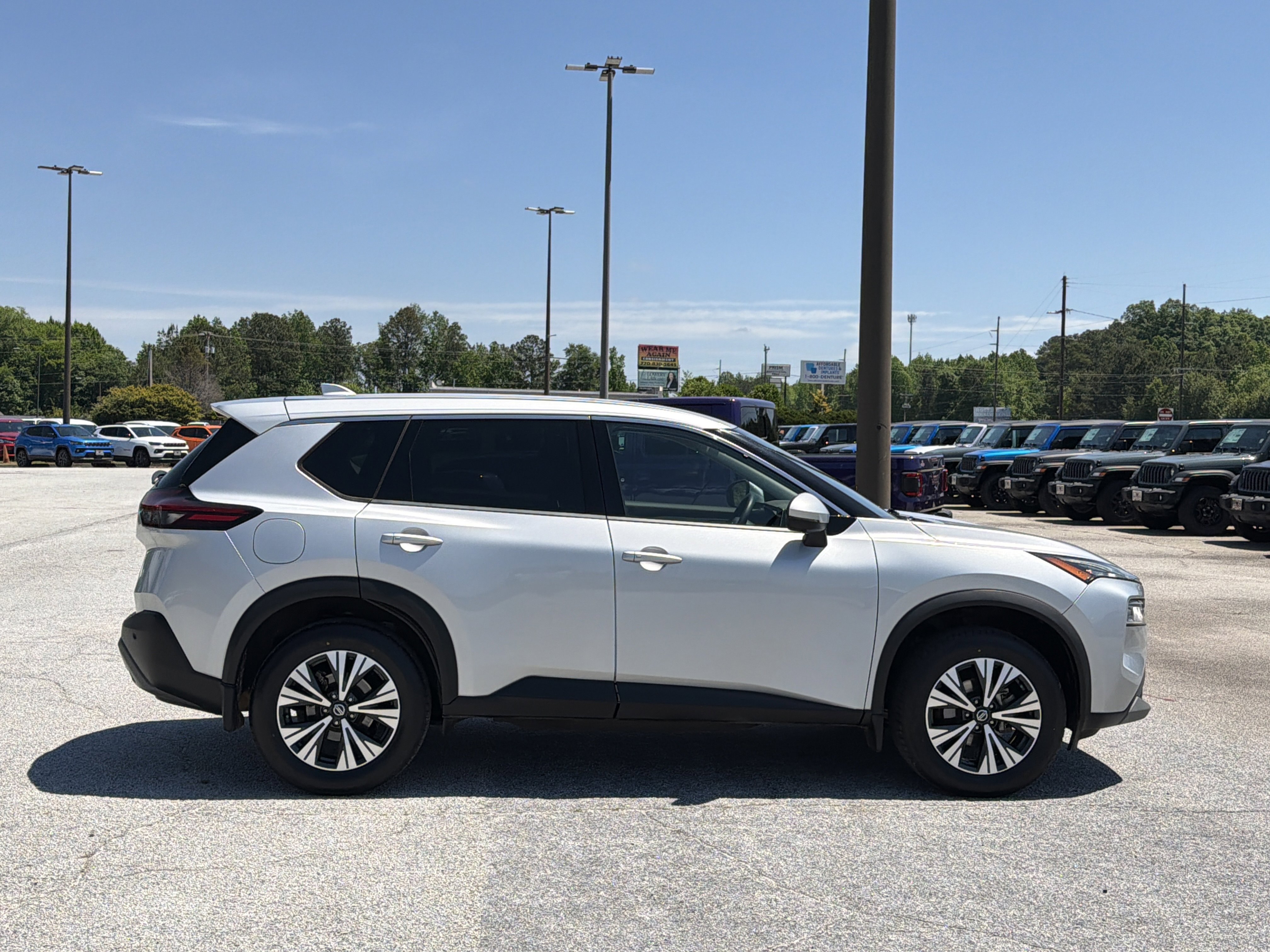 Used 2021 Brilliant Silver Metallic Nissan SV image 12