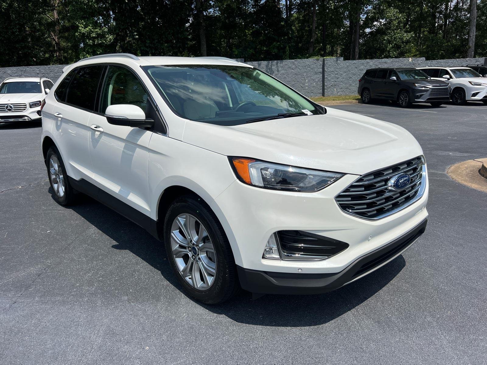 Used 2022 Star White Metallic Tri-Coat Ford Titanium image 3