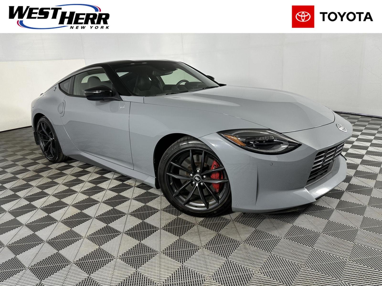 Used 2024 Boulder Gray/Super Black Nissan Performance image 1