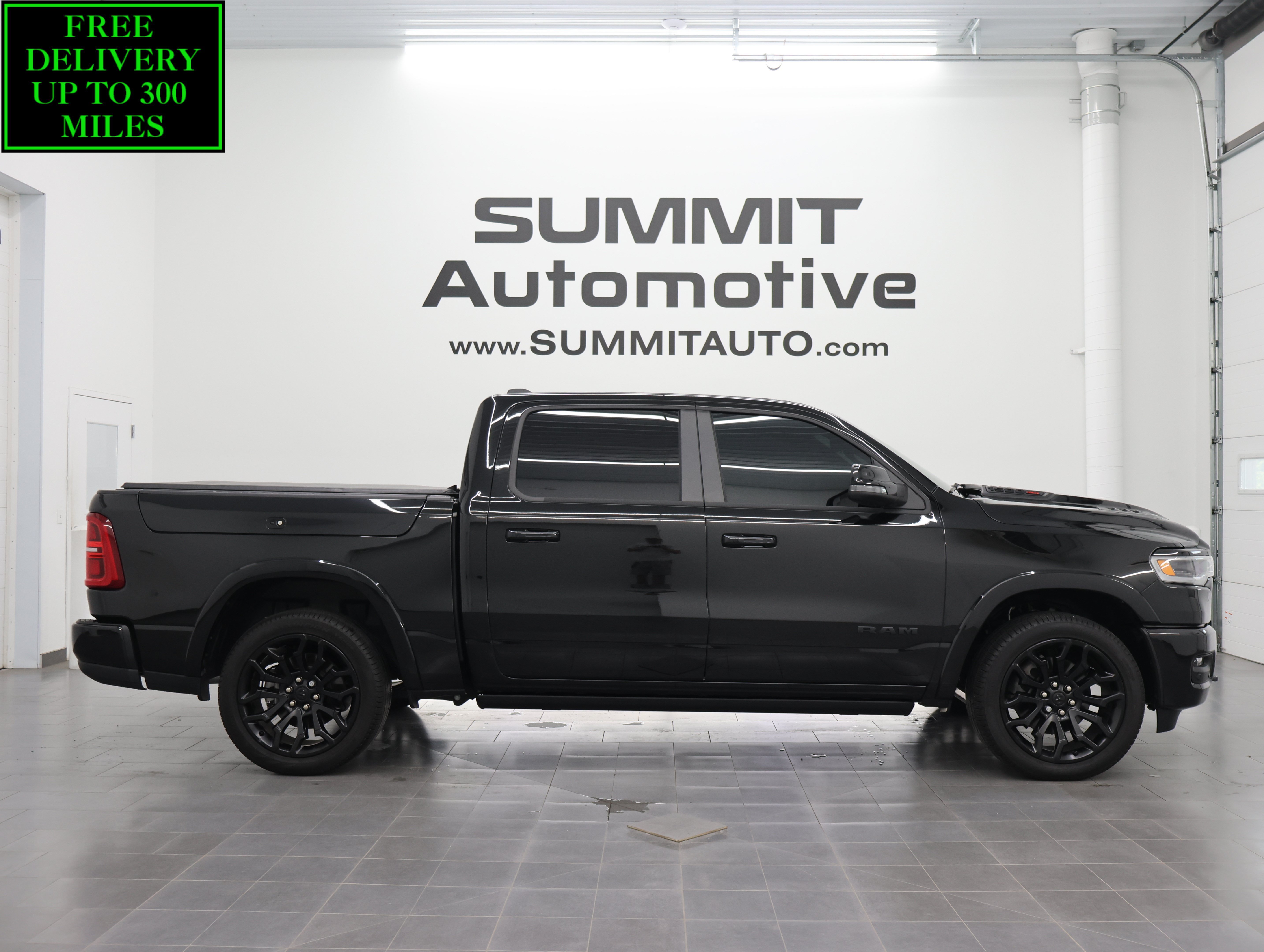Used 2025 Diamond Black Crystal Pearlcoat Ram Limited image 1