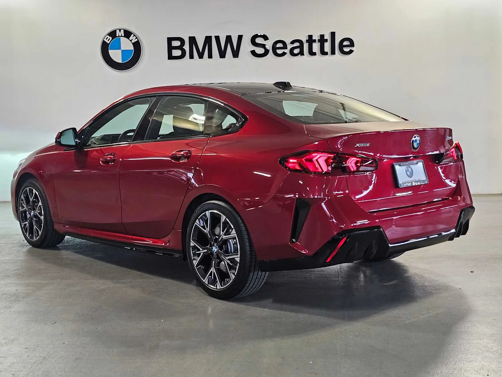 Certified Used 2025 Vegas Red Metallic BMW 228 xDrive image 3