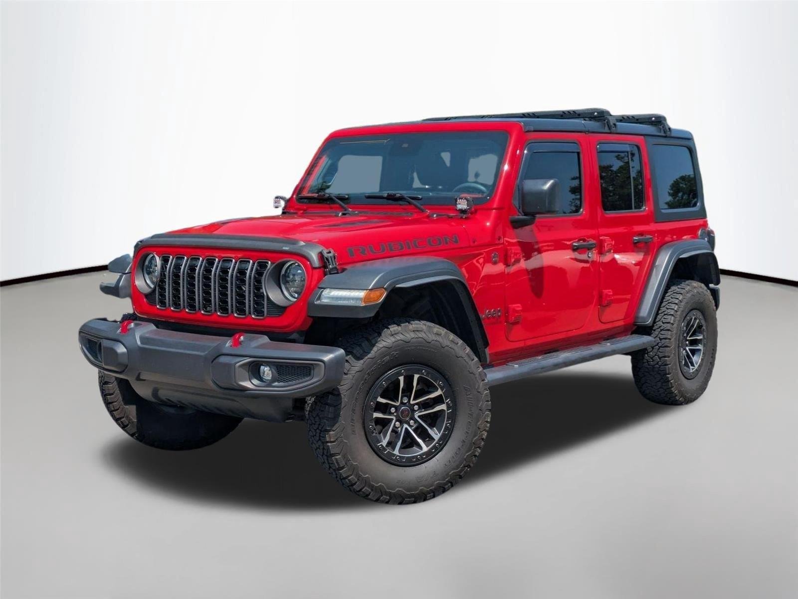 Used 2024 Firecracker Red Clearcoat Jeep Rubicon image 1