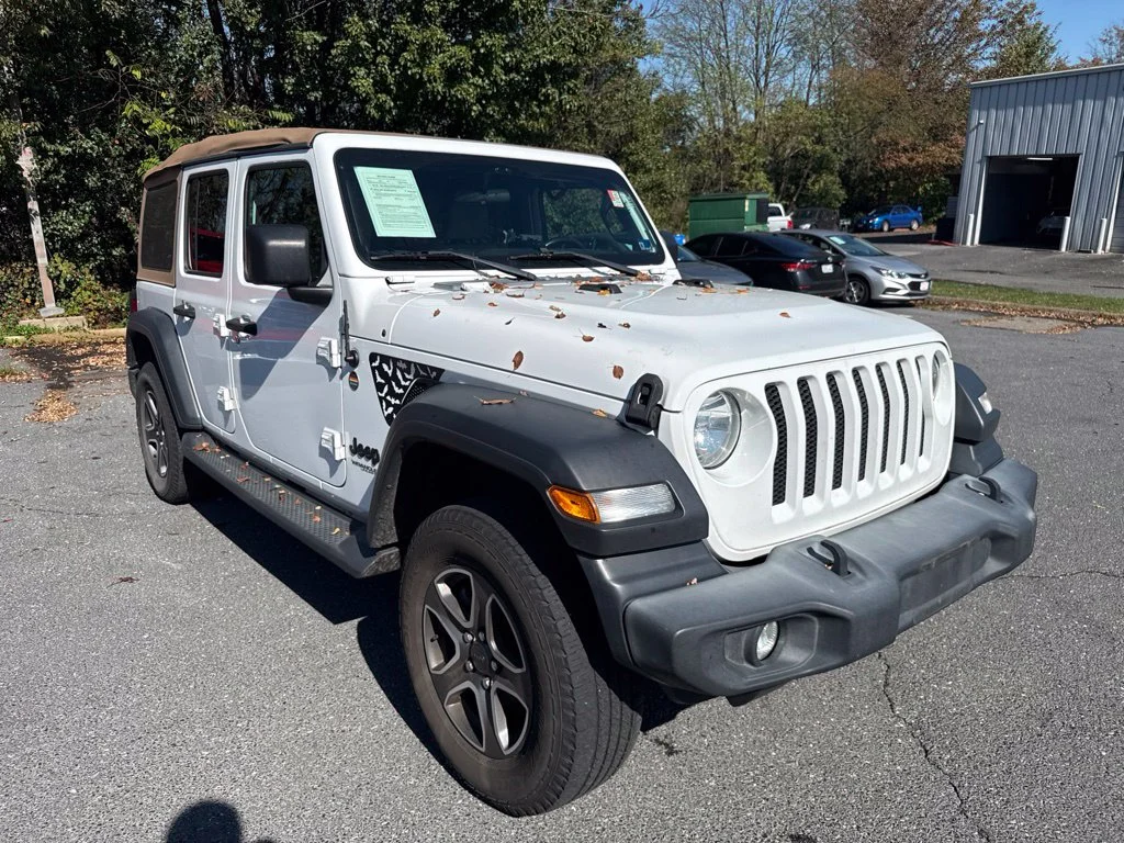 Used 2020 White Jeep Unlimited Sport image 1