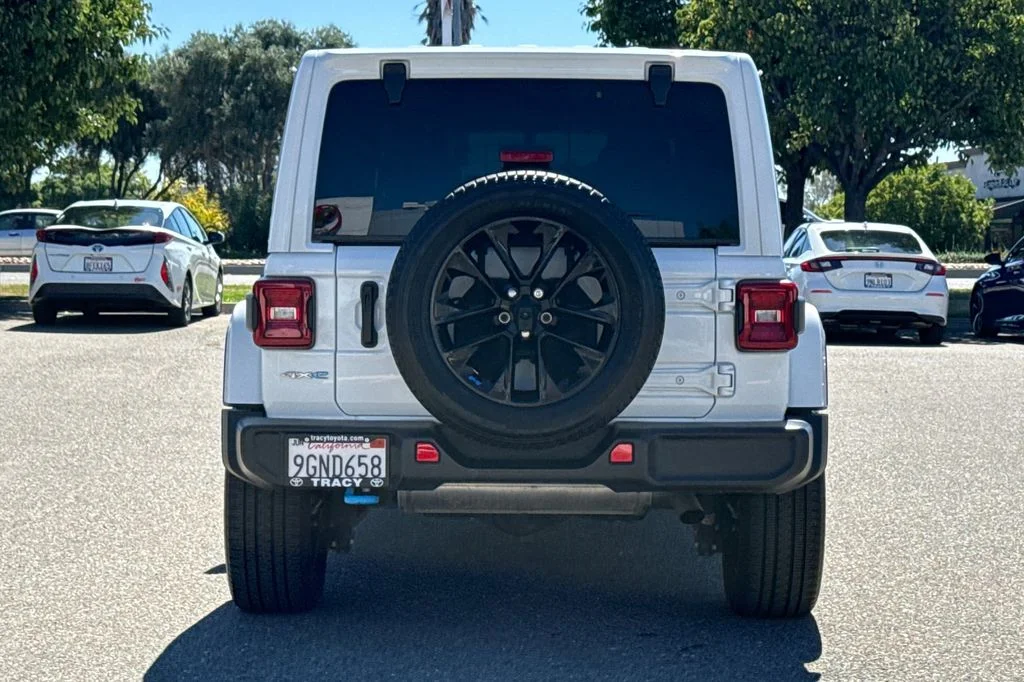 Used 2023 White Jeep Sahara 4xe image 7