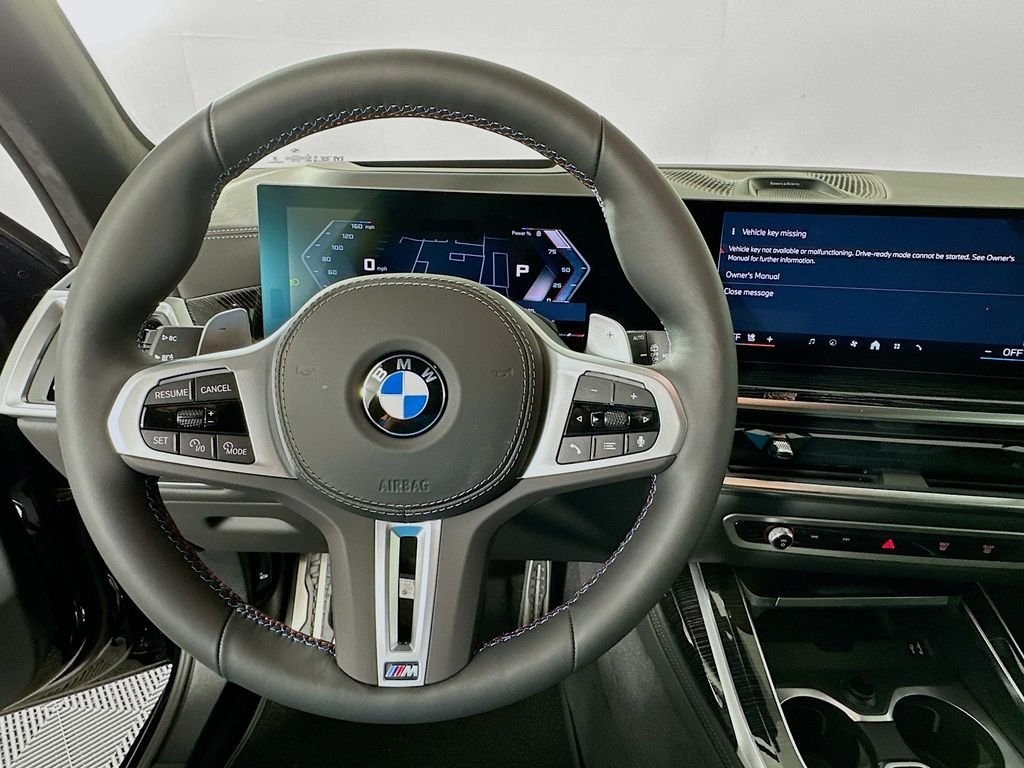 New 2027 Black Sapphire Metallic BMW M60i image 10