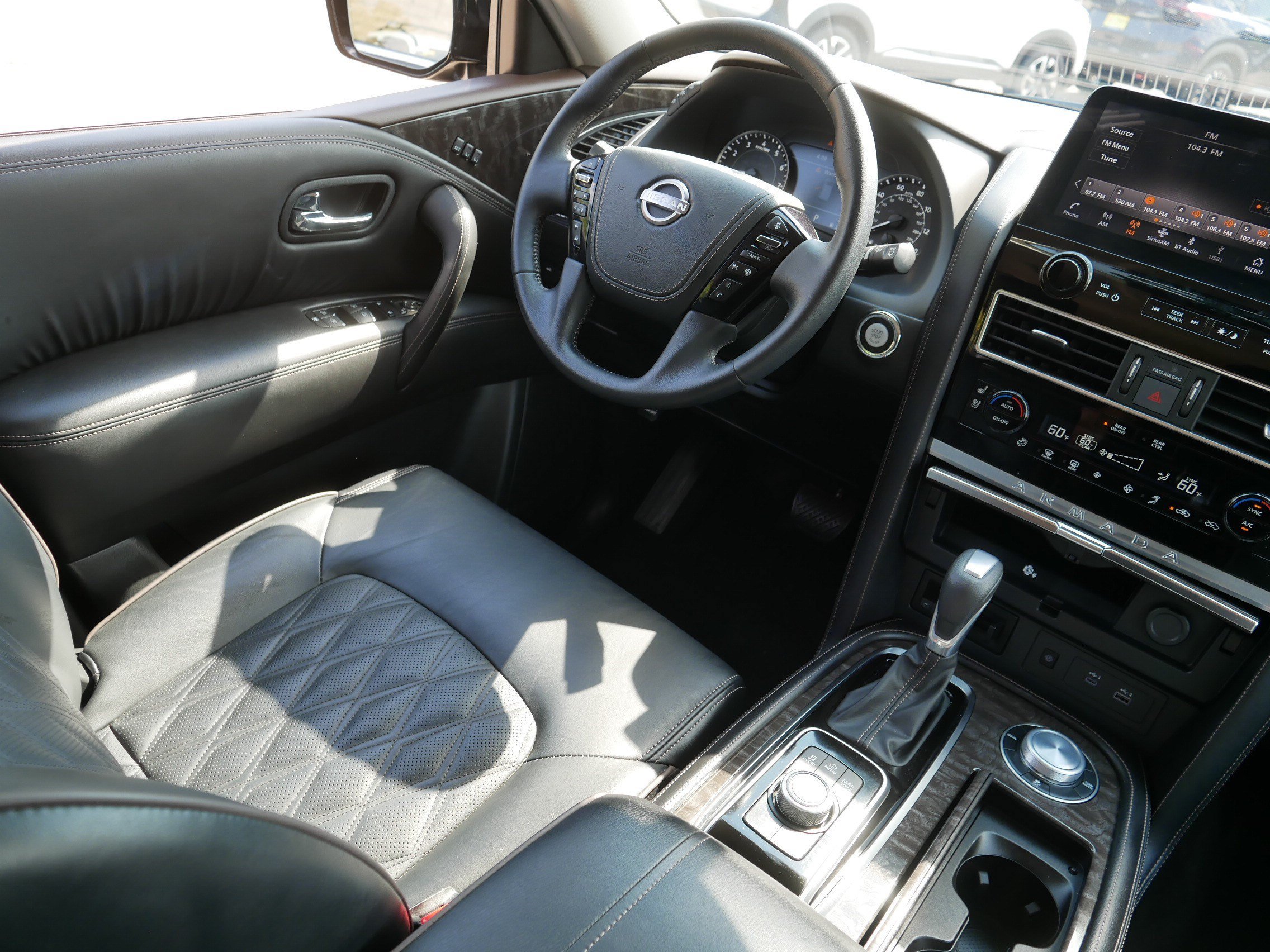 Used 2024 Super Black Nissan Platinum image 9