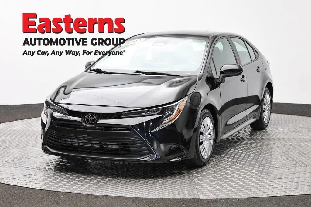 Used 2023 Black Toyota LE image 1