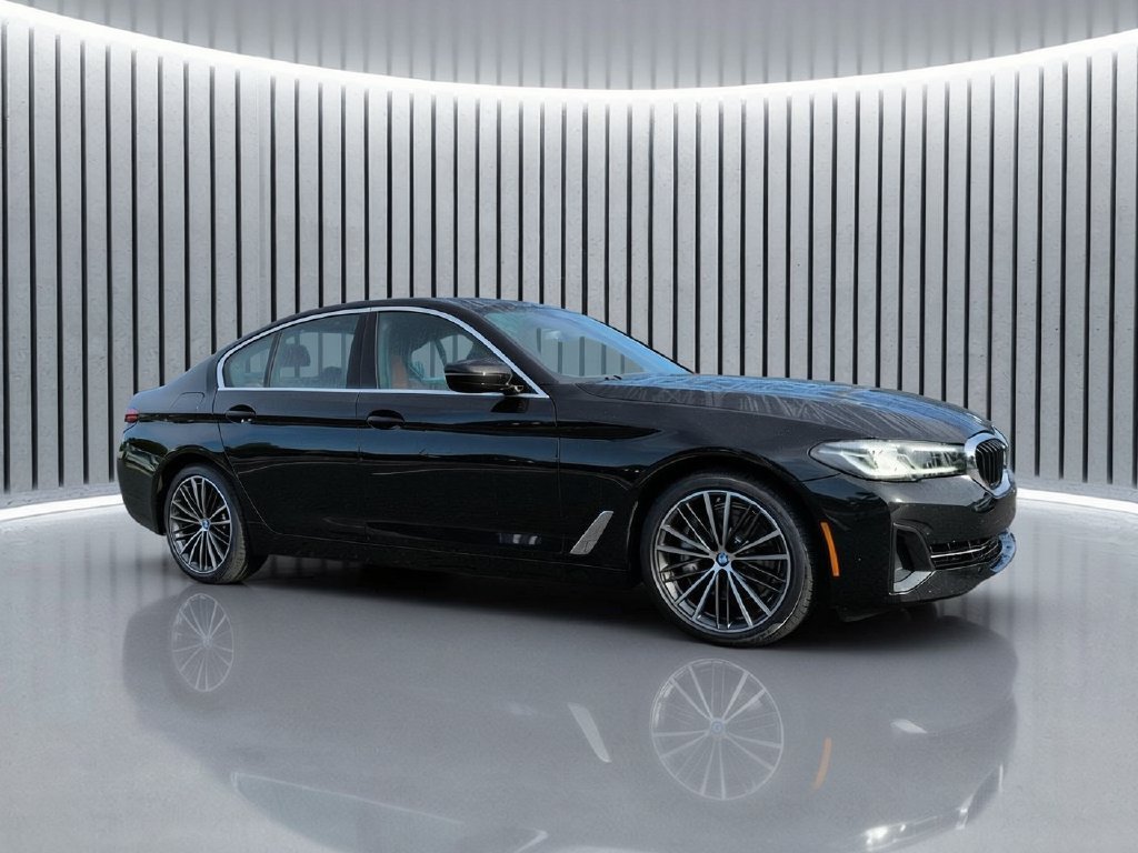 Used 2023 Black Sapphire Metallic BMW 540i xDrive image 1