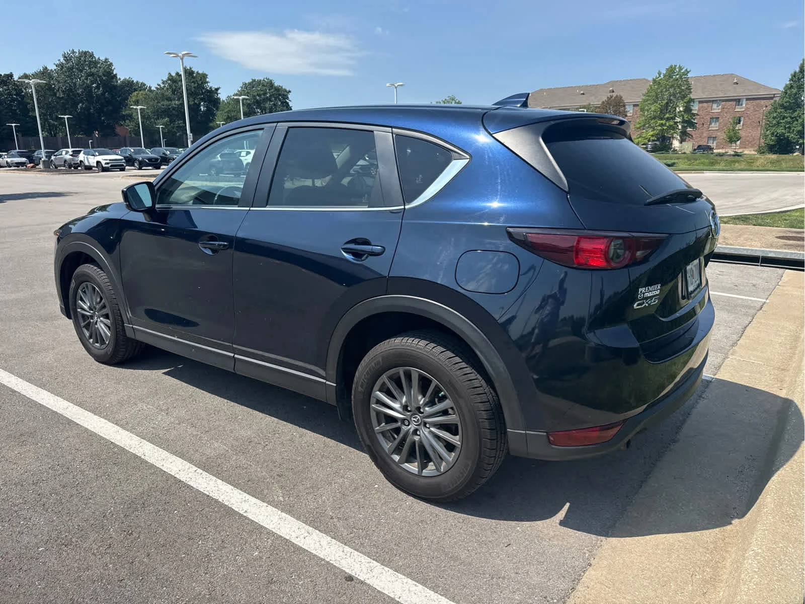 Used 2017 Deep Crystal Blue Mica Mazda Touring image 3