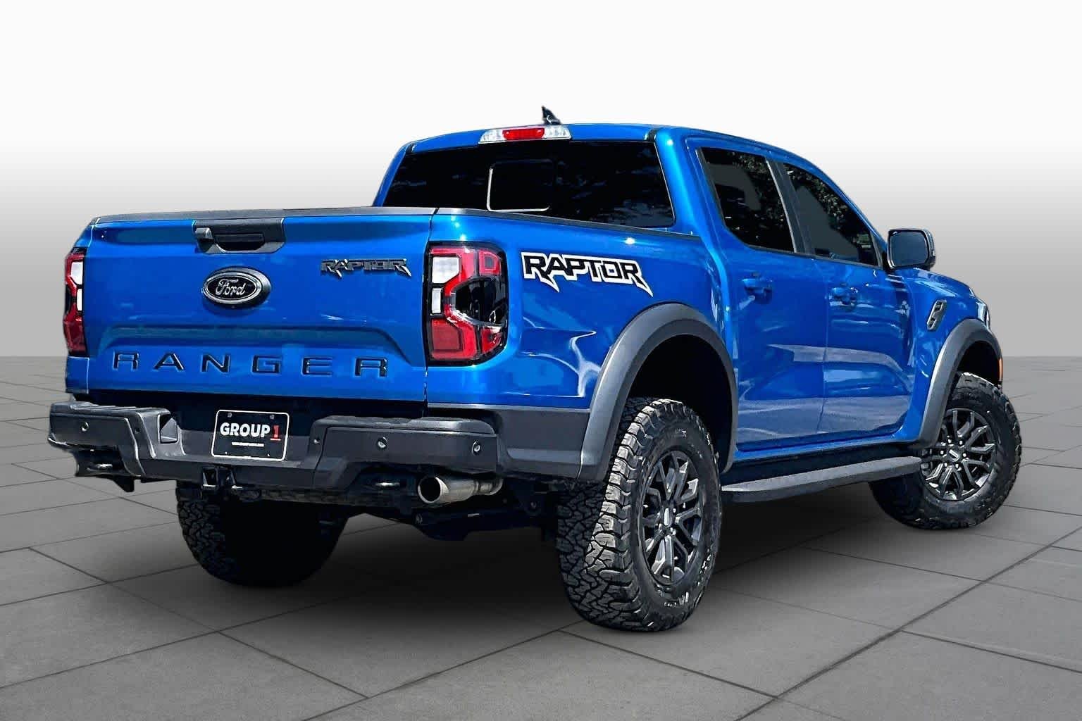 Used 2024 Velocity Blue Metallic Ford Raptor image 13