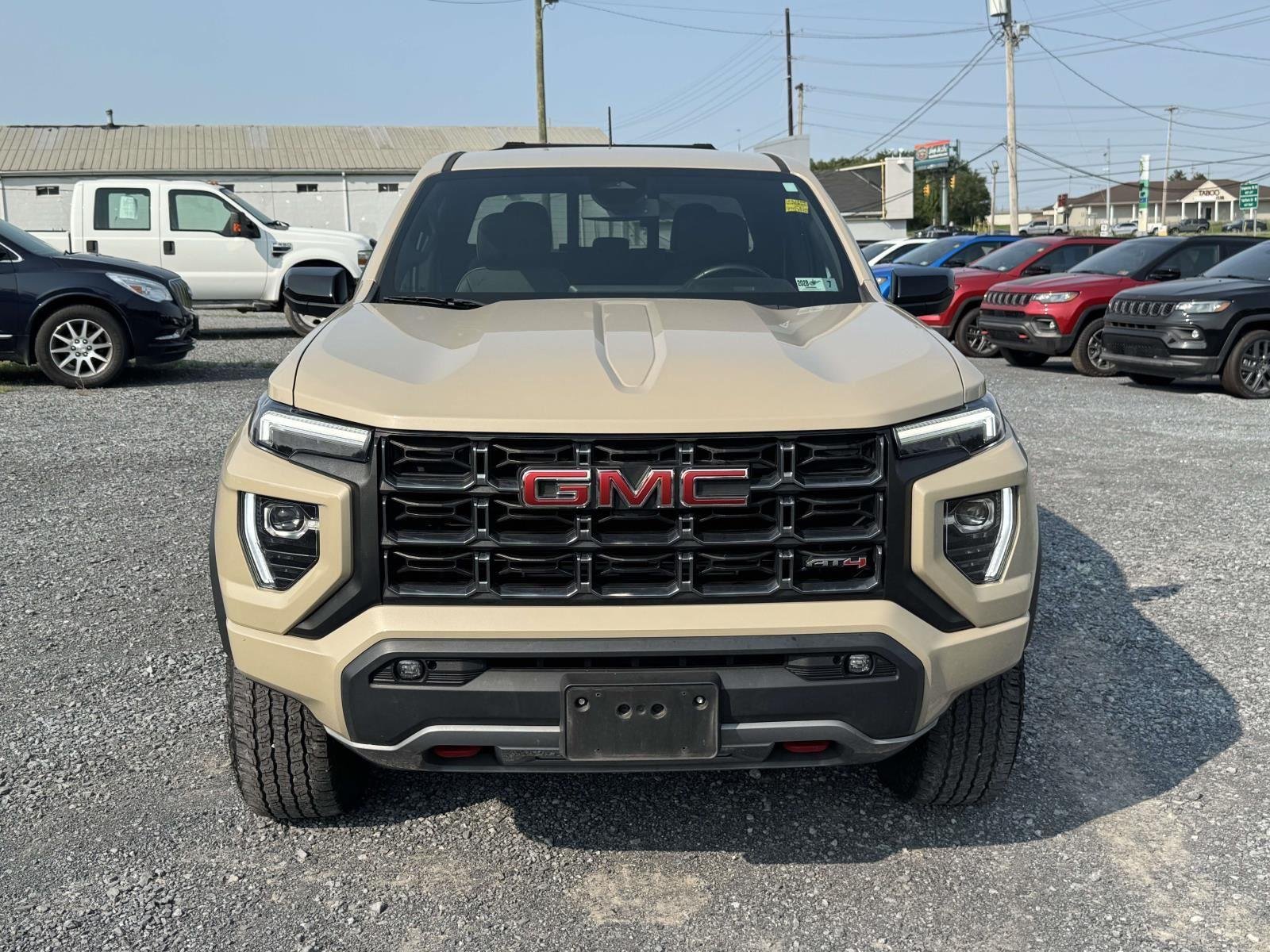 Used 2023 Desert Sand Metallic GMC 4WD AT4 image 26