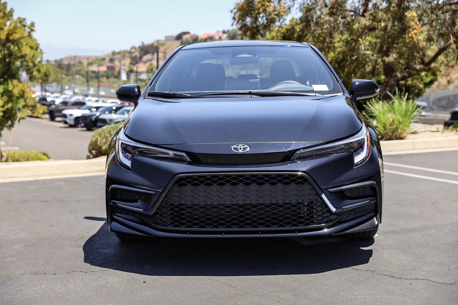 New 2026 Midnight Black Metallic Toyota  SE image 2