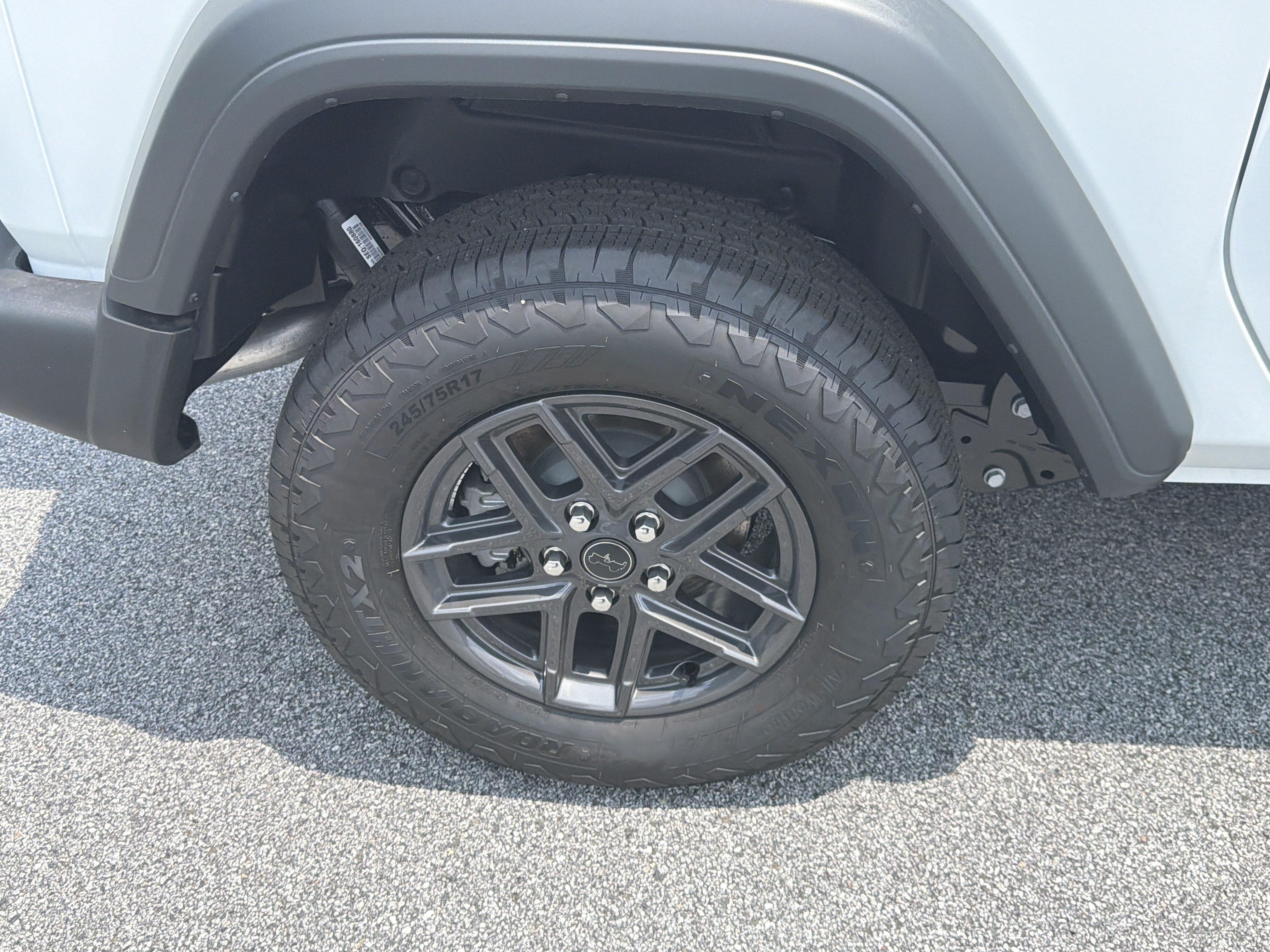 New 2026 Bright White Clear-Coat Exterior Paint Jeep Sport S image 18