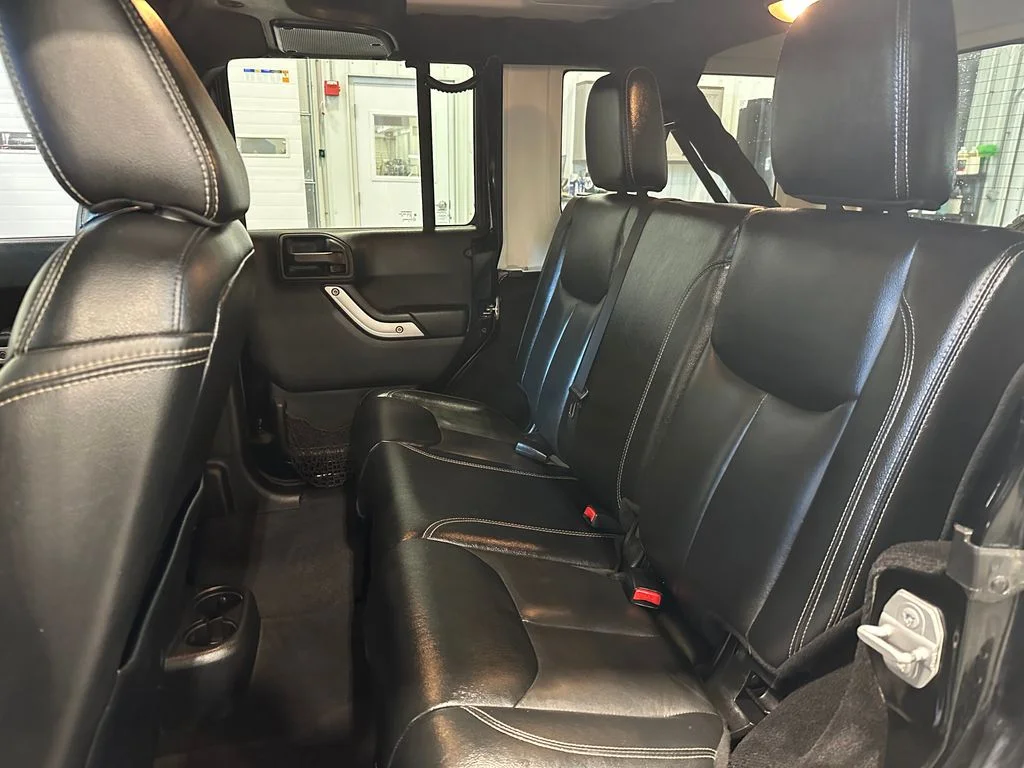 Used 2016 Black Jeep Unlimited Sahara image 23