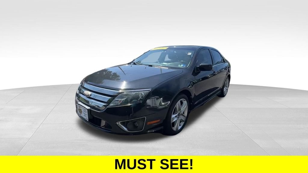 Used 2011 Tuxedo Black Metallic Ford Sport image 3