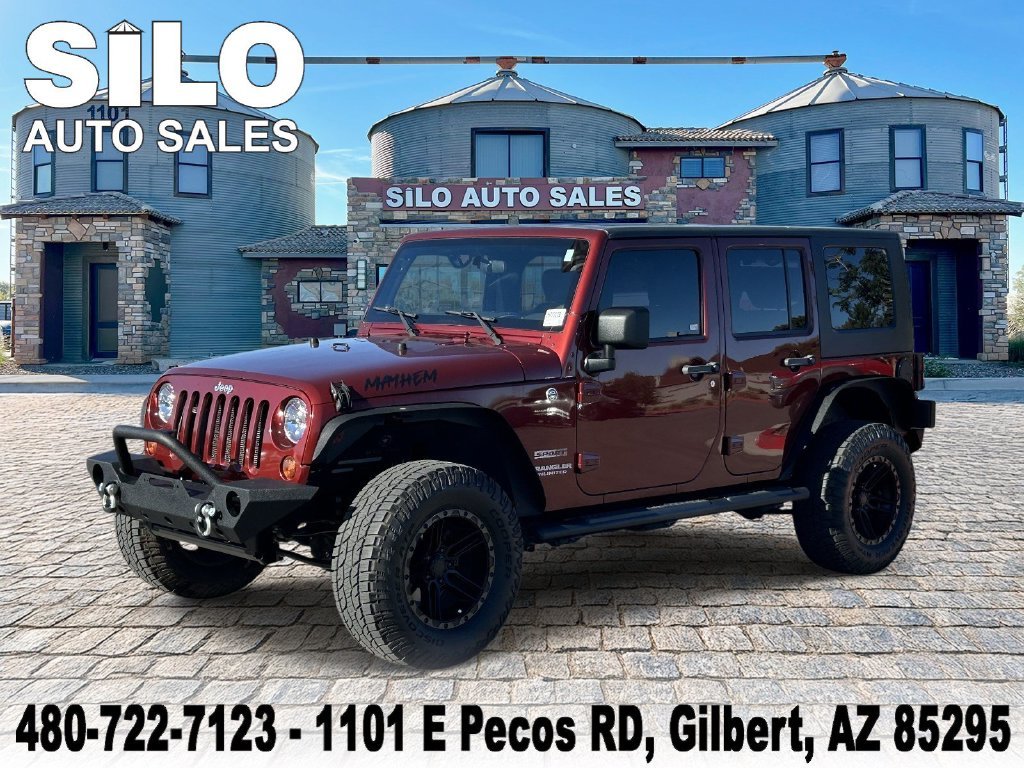 Used 2010  Jeep Unlimited Sport image 1