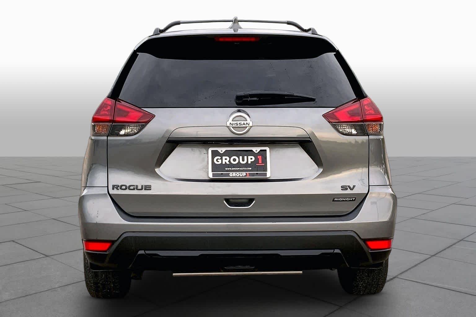 Used 2018 Gun Metallic Nissan SV image 5