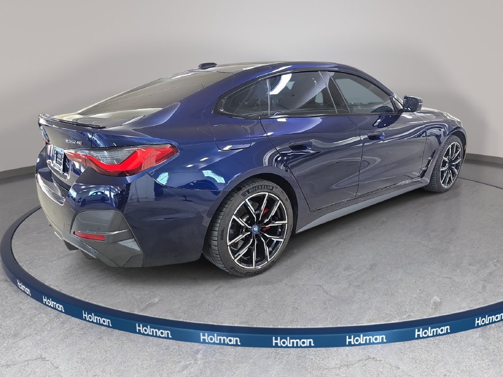 Used 2023 Tanzanite Blue II Metallic BMW eDrive40 image 7