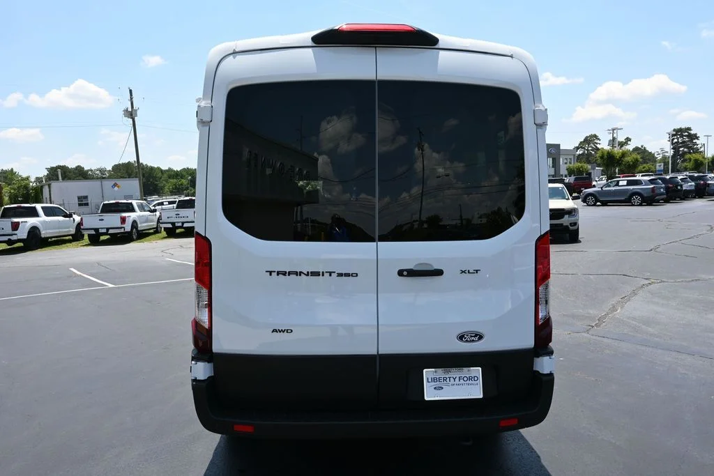 New 2026 Oxford White Ford Passenger Van XLT image 30