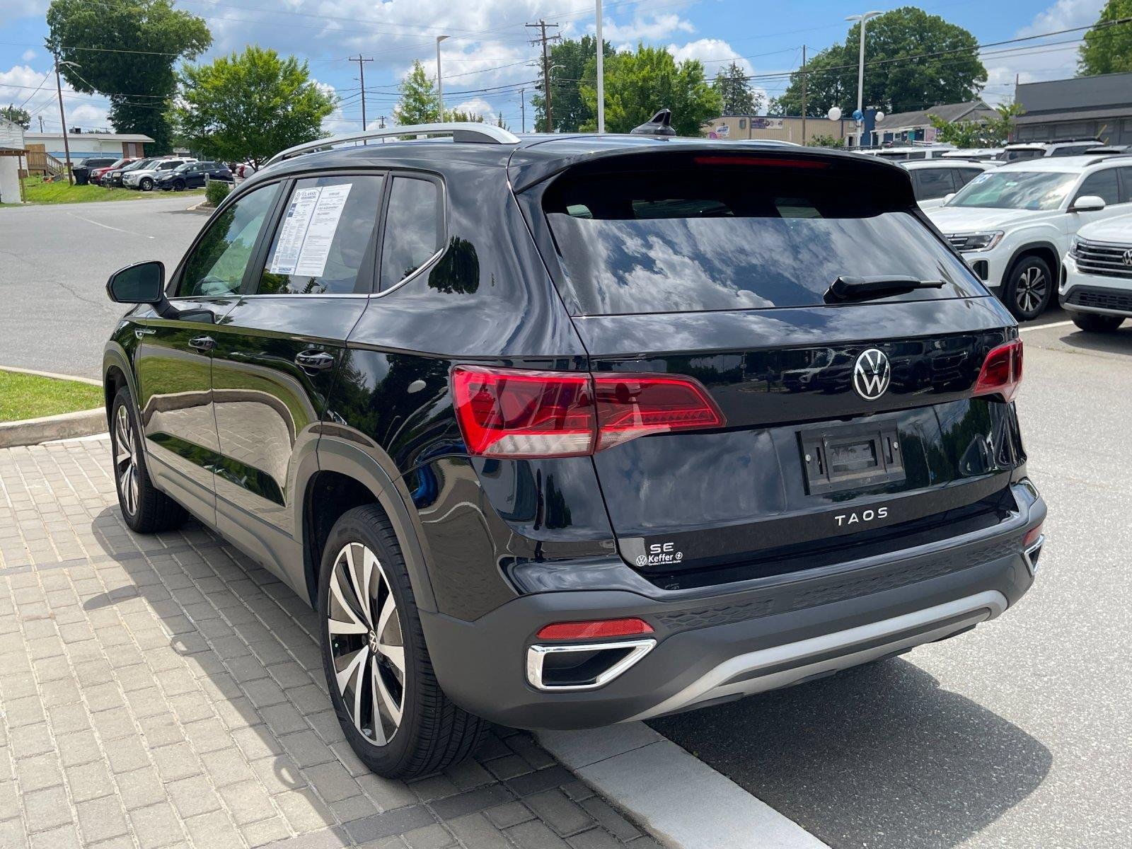 Used 2024 Deep Black Pearl Volkswagen SE image 3