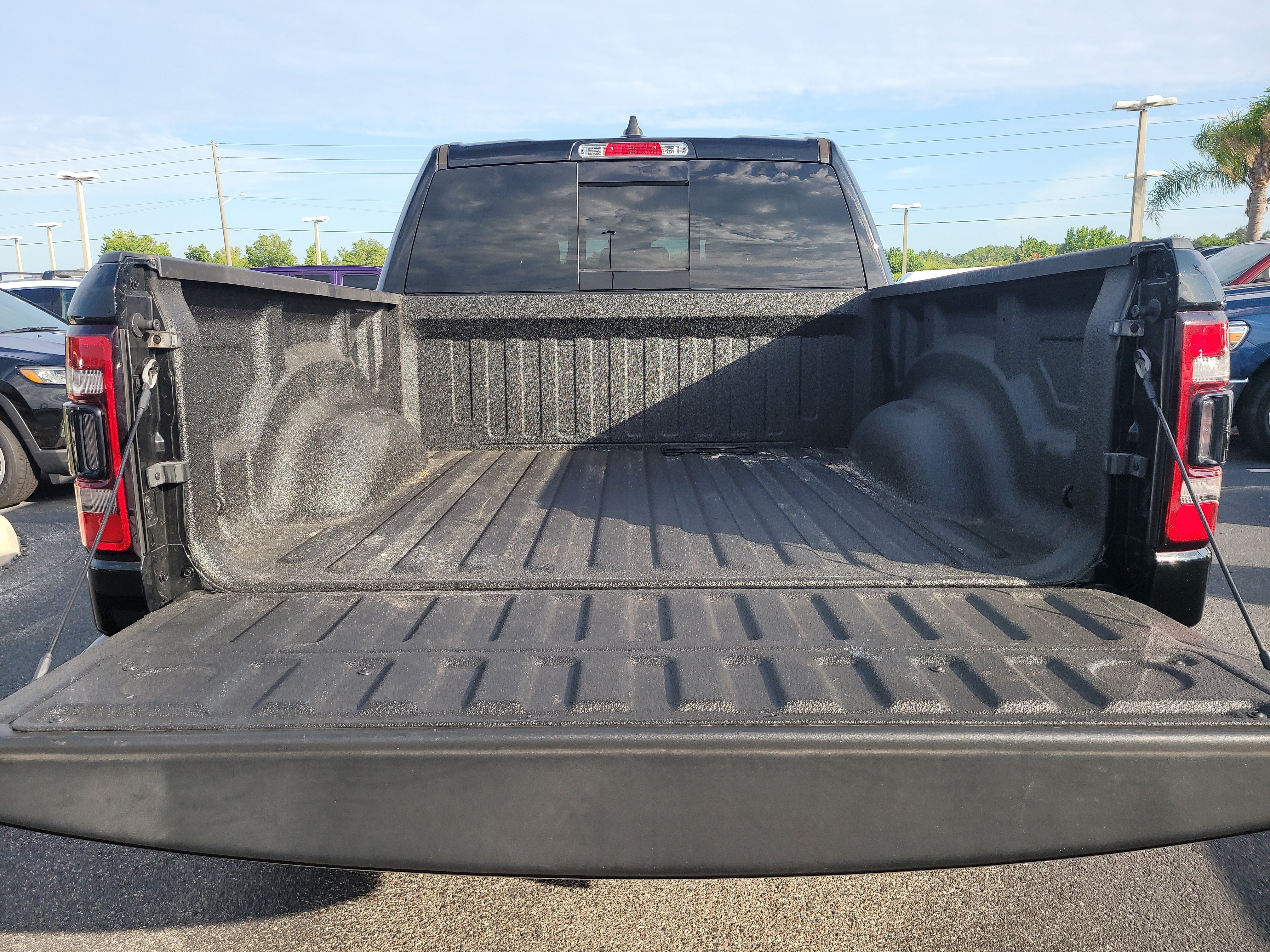 Used 2023 Diamond Black Crystal Pearlcoat Ram Laramie image 8
