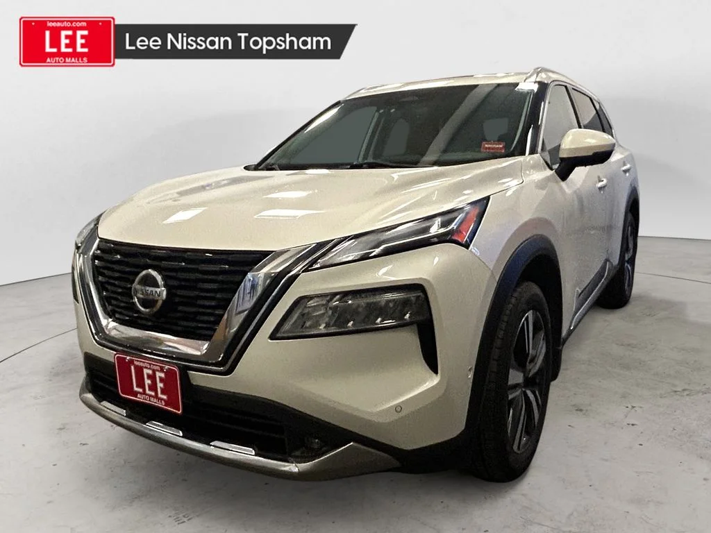 Used 2021 Pearl White Nissan Platinum image 1