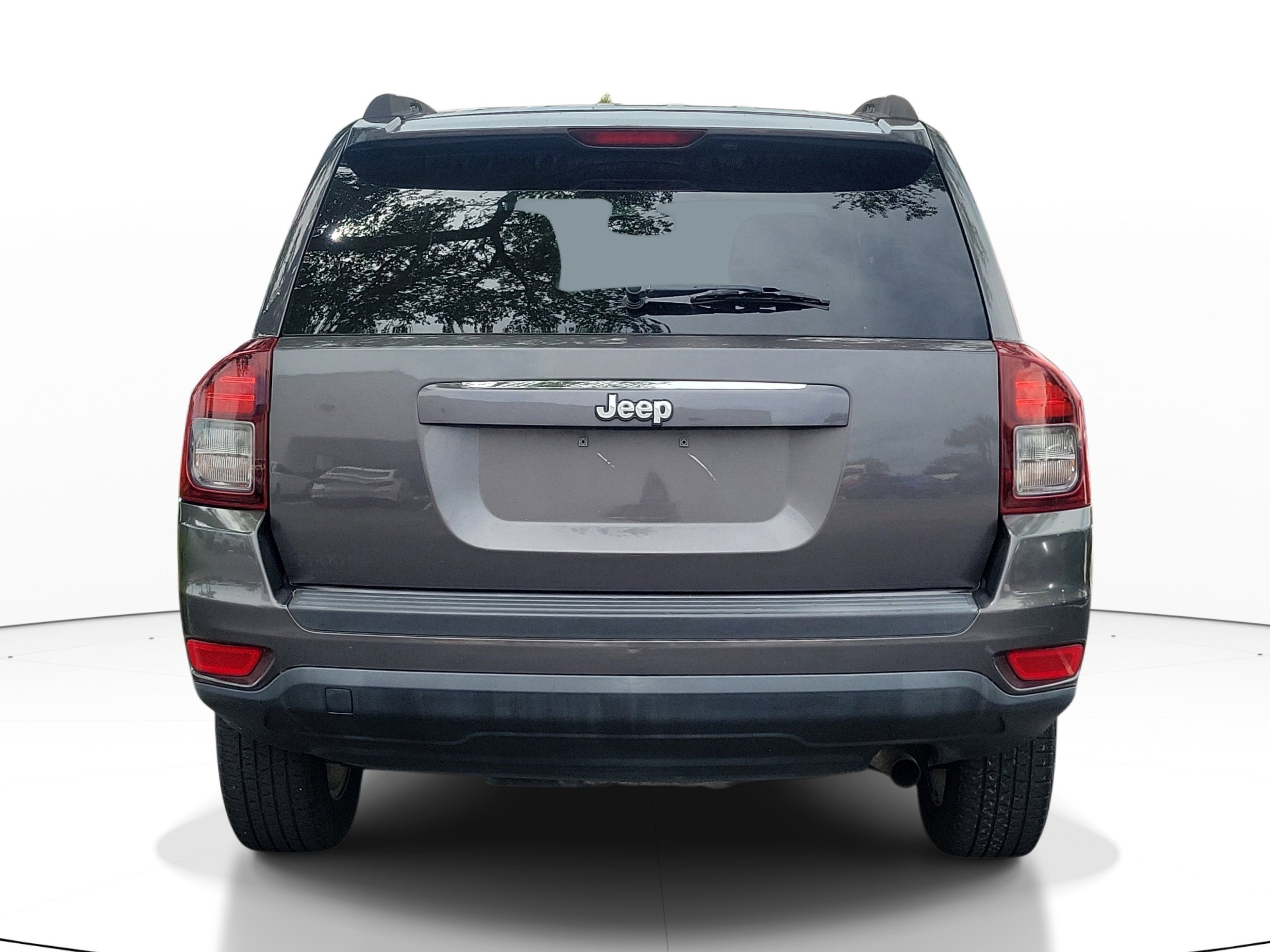 Used 2015 Granite Crystal Metallic Clearcoat Jeep Sport image 9