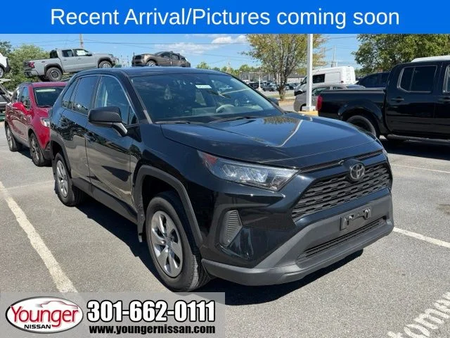 Used 2022 Midnight Black Metallic Toyota LE image 1
