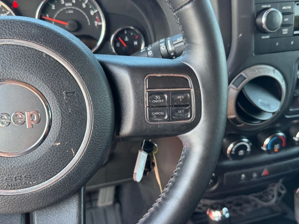 Used 2014 Red Jeep Unlimited Sport image 22