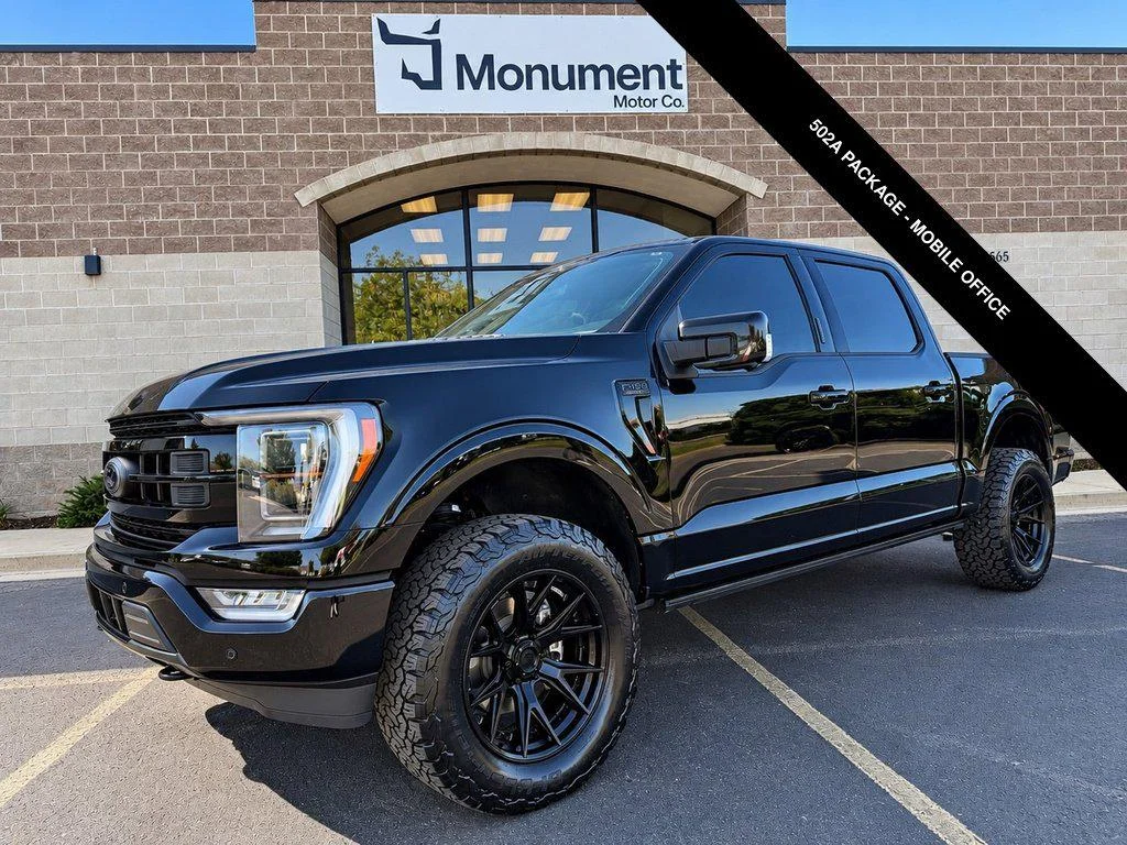 Used 2023 Agate Black Metallic Ford LARIAT 4WD SUPERCREW 5.5 BOX image 1