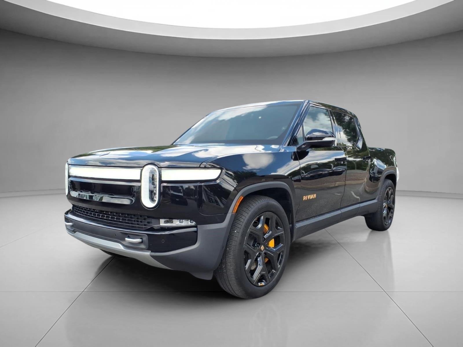 Used 2024 Midnight Rivian Adventure image 1