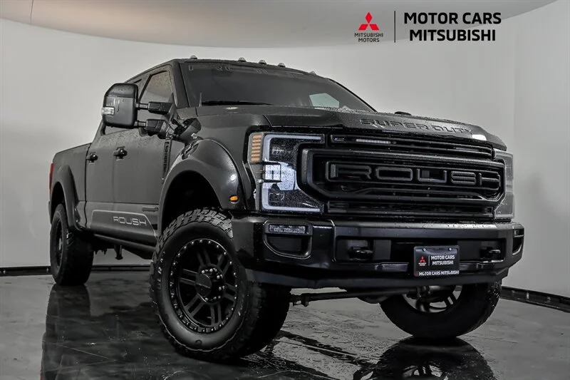 Used 2021 Agate Black Ford Lariat image 1