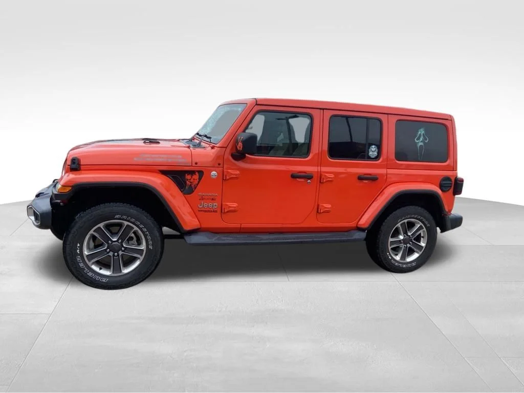 Used 2019 Orange Jeep Unlimited Sahara image 22