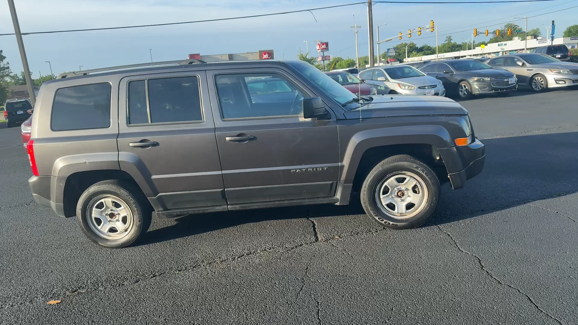 Used 2016 Grey Jeep SPORT SUV image 4