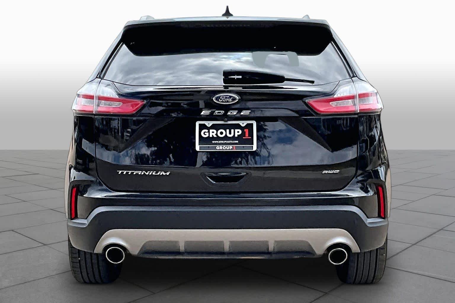 Used 2022 Agate Black Metallic Ford Titanium image 5